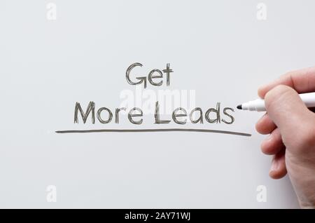 Get more leads written on whiteboard Stock Photo