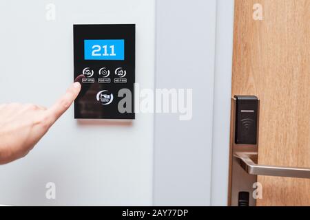 Digital touchpad panel for hotel room management and customer access control Stock Photo