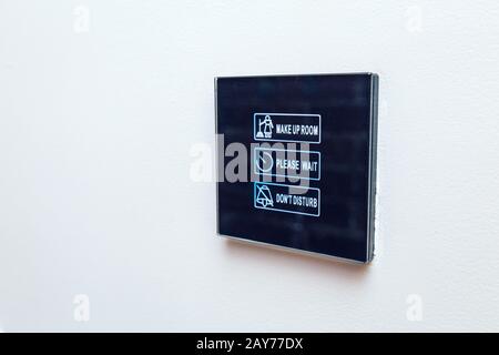Digital touchpad panel for hotel room management and customer access control Stock Photo