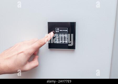 Digital touchpad panel for hotel room management and customer access control Stock Photo