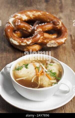 Bavarian semolina dumpling in the soup Stock Photo