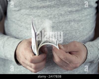 Hands counting dollars Stock Photo