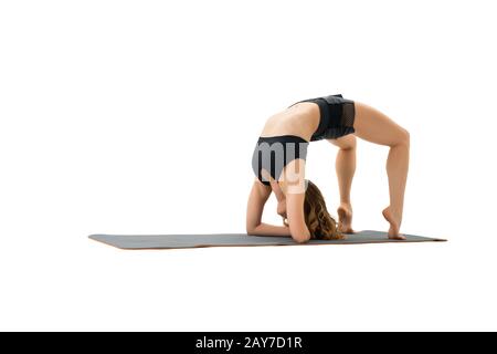 Woman doing back-band in studio isolated shot Stock Photo