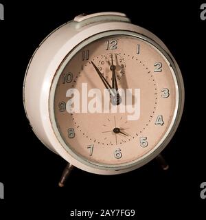 Old alarm clock five to twelve Stock Photo