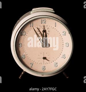 Old alarm clock five to twelve Stock Photo