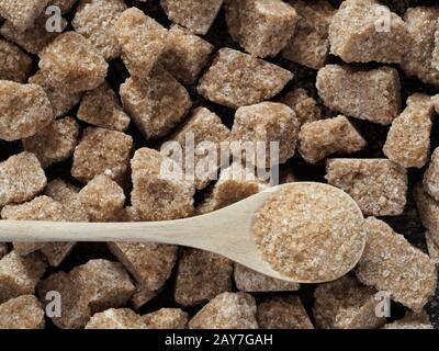Rushy raw sugar cubes close up Stock Photo