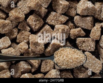 Rushy raw sugar cubes close up Stock Photo