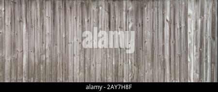 Long gray wooden fence Stock Photo