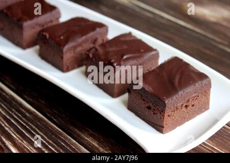 Chocolate Pumpkin Brownie. Pumpkin Pie. Chocolate cake. Homemade pastries. A delicate and creamy cake. Stock Photo