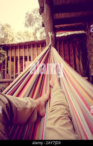 Relaxing in hammock Stock Photo