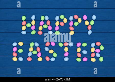 Happy Easter, the inscription is laid out with colored eggs on a blue wooden table.3D rendering. Stock Photo