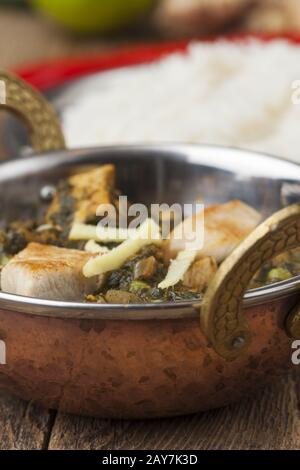 Indian Murgh Palak dish with rice Stock Photo