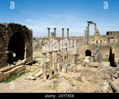 Syria, Bosra. Ruins of the Roman baths and the archaeological city. Photo taken before the Syrian civil war. Stock Photo