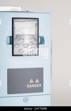 A new universal inverter for controlling the electric current and power for industrial on a gray white background. Stock Photo