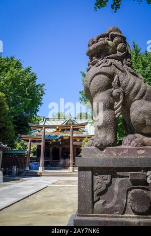 Lion statue in Ushijima Shrine temple, Tokyo, Japan Stock Photo