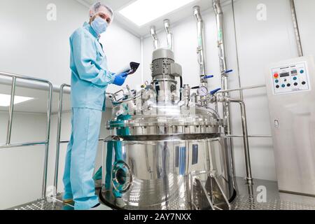 scientist in checking the readings Stock Photo