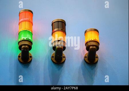 Three Warning lamps on the work of industrial equipment . Stock Photo