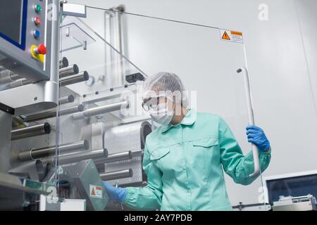 factory worker work with machine Stock Photo