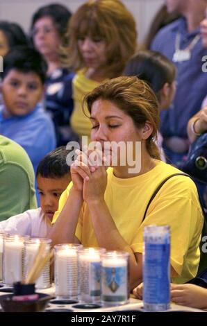 San Juan, Texas: Worshipers at the Basilica of Our Lady of Del Valle in South Texas. ©Bob Daemmrich Stock Photo