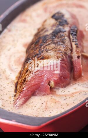 Close-up of a meat roulade in cream sauce Stock Photo