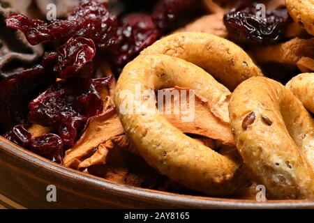 food as a background - whole grain wheat bagels with dried fruits Stock Photo
