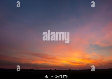 Wonderful colorful clouds after sunset Stock Photo