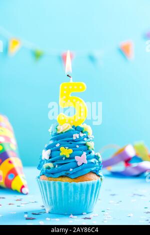 Fifth 5th birthday cupcake with candle. Card mockup. Stock Photo