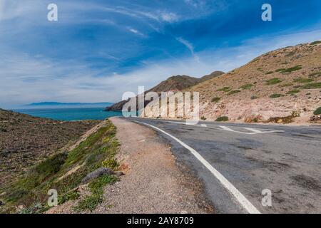 Empty road in Cabo De Gata, Spain Stock Photo