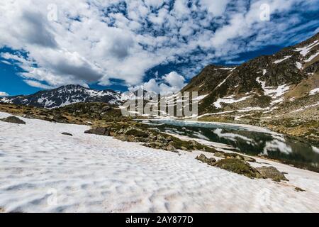 Snow patches in Pyrenees at spring time Stock Photo