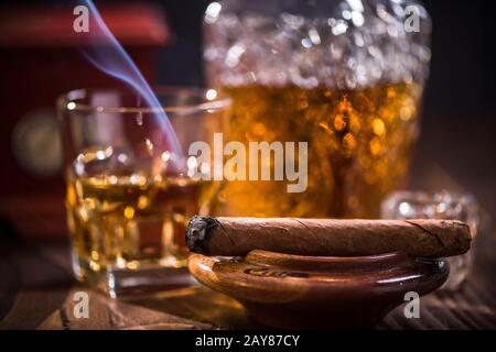 Luxurious smoking cuban cigar in ashtray Stock Photo