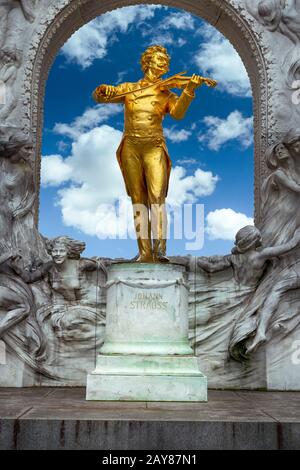 Gilded bronze monument of Johann Strauss in the Viennese City Park, one of the most known and most frequently photographed monuments in Vienna. It was Stock Photo