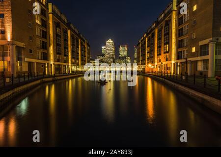 Cityscape of Canary Wharf London financial sky scrapers at night Stock Photo