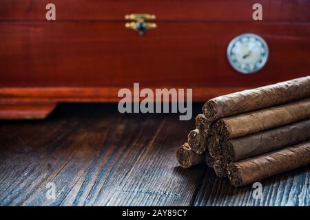 Cuban cigars and wooden humidor Stock Photo
