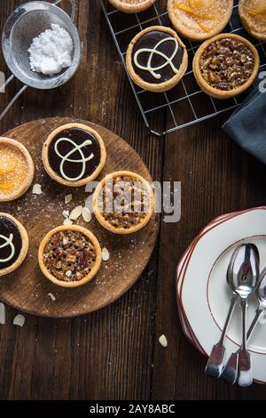 Baking and decorating tarts at home Stock Photo