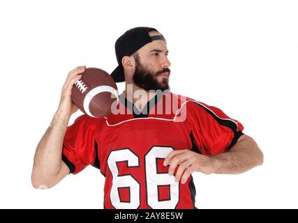 Closeup of a football player with his football in his hand Stock Photo