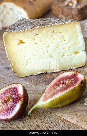 Tomme de Savoie, a variety of Tomme cheese from Savoy Stock Photo