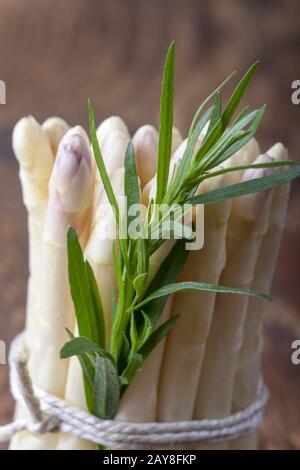 white asparagus on dark wood Stock Photo