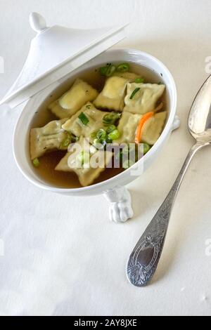 Swabian dumpling soup Stock Photo