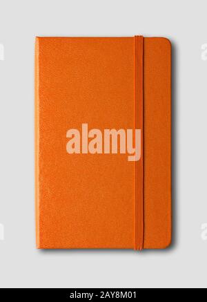 Orange closed notebook isolated on grey Stock Photo