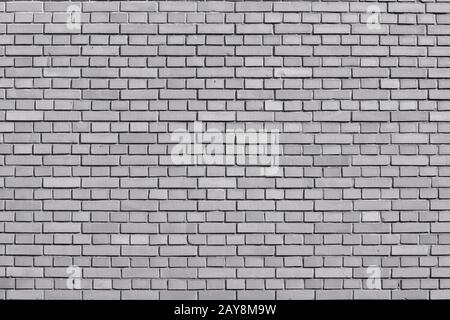Quiet gray colored brick wall background Stock Photo