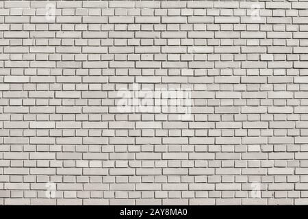 Tofu colored brick wall background Stock Photo