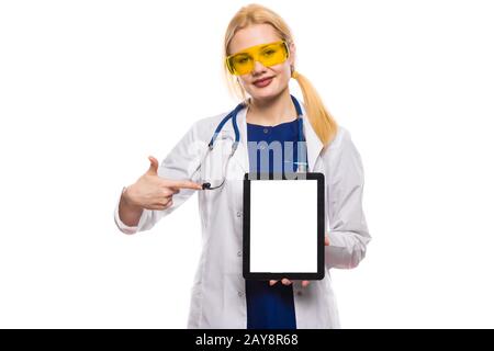 Woman doctor in white coat with tablet Stock Photo