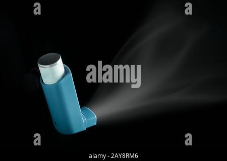 Mdi Inhaler Being Pushed Over Black Background Asthma Aerosol For People With Respiratory Problems Stock Photo Alamy