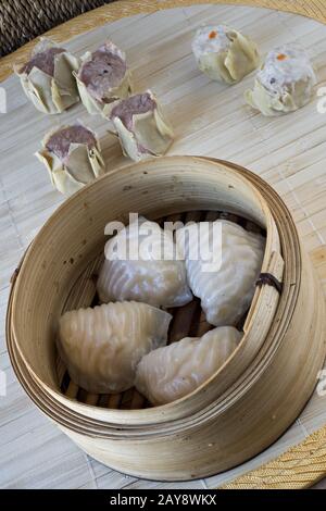 Dimsum, Chinese dumplings  steamed and raw Stock Photo