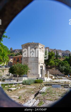 View through gate of Tower of the Wind-gods in Roman Forum and Acropolis Stock Photo
