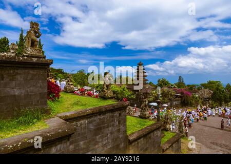 BALI INDONESIA - APRIL 26: People in Pura Besakih Temple on April 26, 2016 in Bali Island, Indonesia Stock Photo