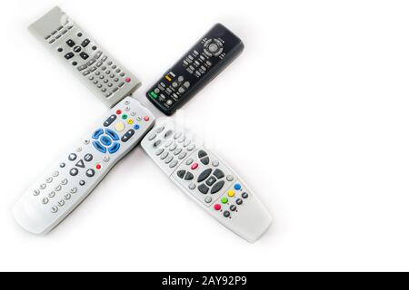 Modern and Old Remote Controls on white with Copy-space Stock Photo