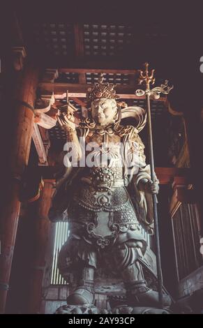 Komokuten statue in Daibutsu-den Todai-ji temple, Nara, Japan Stock Photo