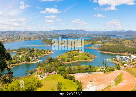 aerial view of the artificial lake of the Penol in a sunny day Guatape Stock Photo