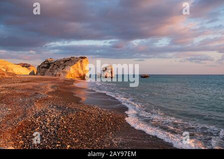 Beautiful afternoon view of the beach around Petra tou Romiou, also known as Aphrodite's birthplace, in Paphos, Cyprus. Stock Photo